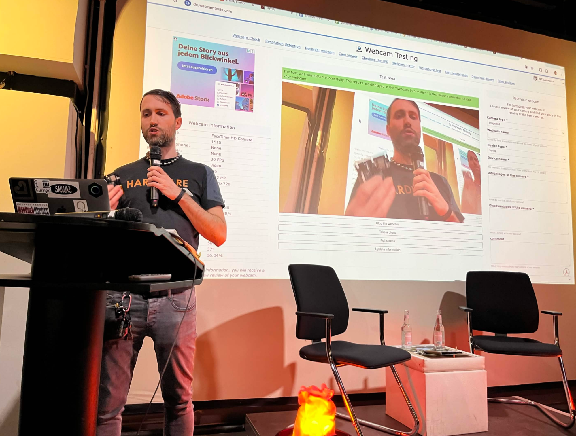 Afri presenting the badge prototype for DWeb Camp 2026