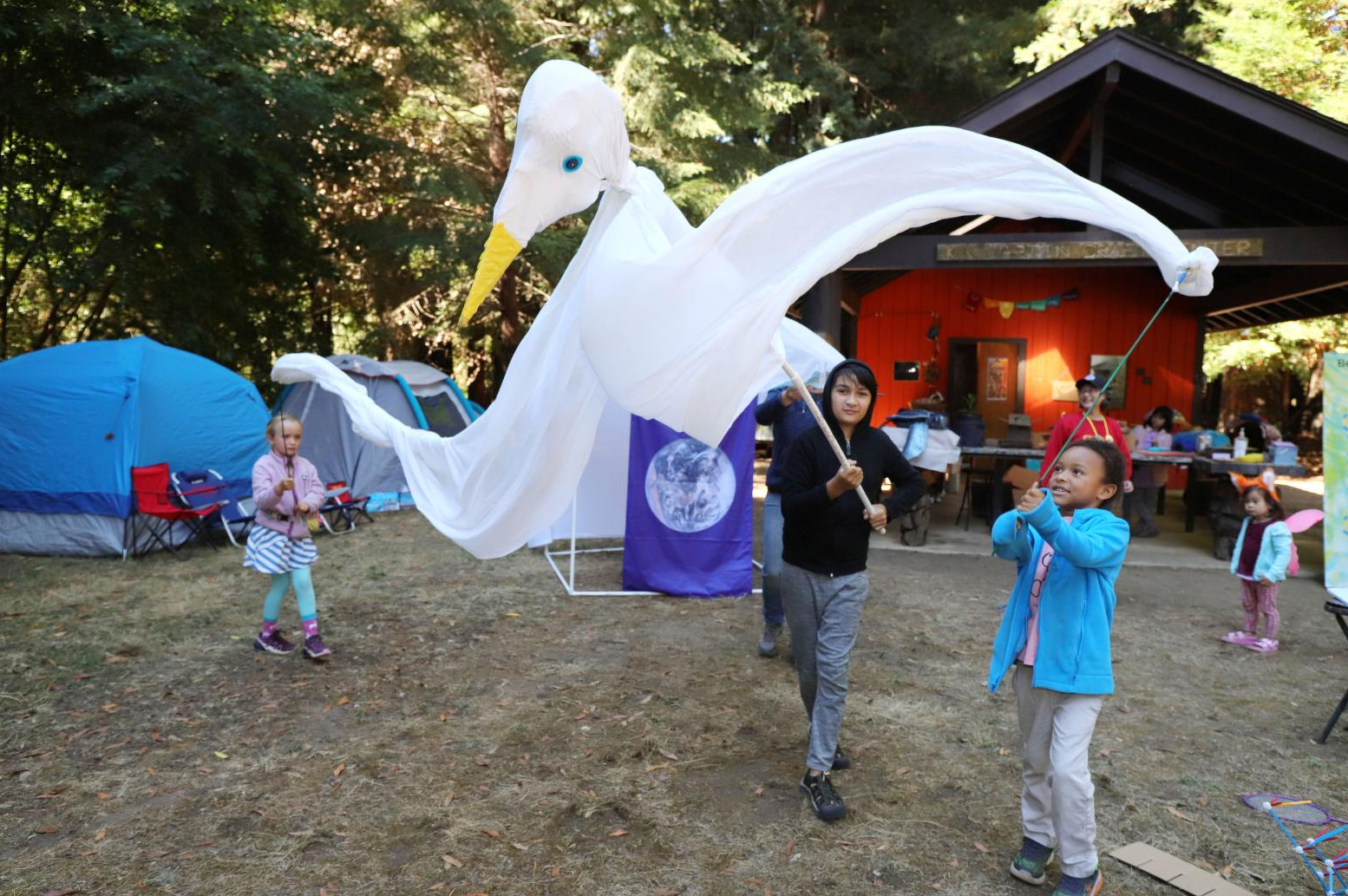 A Seedlings Tradition: we end with a puppet parade to the closing ceremony on Saturday evening.